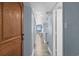 Hallway featuring the entry door and leading to an open floor plan and ocean view at 9550 Shore Dr. # 529, Myrtle Beach, SC 29572