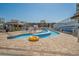 Inviting lazy river with lounge chairs, poolside bar, and relaxing atmosphere, perfect for leisurely enjoyment at 9550 Shore Dr. # 529, Myrtle Beach, SC 29572