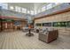 Spacious lobby with comfortable seating, stylish decor, and fish tanks, creating an inviting and elegant atmosphere at 9550 Shore Dr. # 529, Myrtle Beach, SC 29572