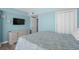 Comfortable main bedroom shows soothing blue color scheme at 9550 Shore Dr. # 529, Myrtle Beach, SC 29572