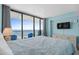 Bright main bedroom features sliding glass doors and ocean views at 9550 Shore Dr. # 529, Myrtle Beach, SC 29572
