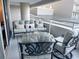Well-furnished balcony with comfortable seating, providing an inviting outdoor space for relaxation and enjoying the view at 9840 Queensway Blvd. # 227, Myrtle Beach, SC 29572