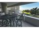Charming balcony with a dining area overlooking the ocean, providing a serene atmosphere for outdoor dining and relaxation at 9840 Queensway Blvd. # 227, Myrtle Beach, SC 29572
