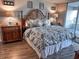 Comfortable bedroom featuring a king-sized bed with decorative pillows and matching nightstands at 9840 Queensway Blvd. # 227, Myrtle Beach, SC 29572