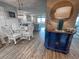 Dining area open to the living room with modern coastal decor and ocean views at 9840 Queensway Blvd. # 227, Myrtle Beach, SC 29572