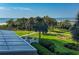 Beautifully landscaped grounds with lush greenery, palm trees, walkways, and ocean view for a relaxing outdoor experience at 9840 Queensway Blvd. # 227, Myrtle Beach, SC 29572
