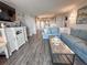 Cozy living room features stylish decor, comfortable seating, and ample natural light, creating a warm and inviting atmosphere at 9840 Queensway Blvd. # 227, Myrtle Beach, SC 29572