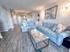Bright living room boasts contemporary design, comfortable seating, and seamlessly connects to other areas, perfect for relaxation at 9840 Queensway Blvd. # 227, Myrtle Beach, SC 29572