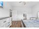 Comfortable bedroom boasts ample natural light and wood-look flooring at 1008 Mary Read Dr., North Myrtle Beach, SC 29582