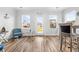 Bright dining area with coastal accents, white trim and wood-look floors at 1008 Mary Read Dr., North Myrtle Beach, SC 29582