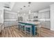 Spacious kitchen featuring an island with seating, granite countertops, stainless steel appliances, and pendant lighting at 1008 Mary Read Dr., North Myrtle Beach, SC 29582
