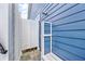 Exterior shower features wood floor and blue siding, perfect for rinsing off after the beach at 1008 Mary Read Dr., North Myrtle Beach, SC 29582