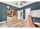 Bedroom featuring a built-in bookcase, natural lighting, and ample storage space at 103 Pigeon Forge Ct., Murrells Inlet, SC 29576