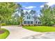 Charming home with manicured lawn, mature trees, and a curved driveway offers curb appeal at 103 Pigeon Forge Ct., Murrells Inlet, SC 29576