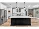 Spacious kitchen with a large island, stainless steel refrigerator, and ample countertop space at 103 Pigeon Forge Ct., Murrells Inlet, SC 29576