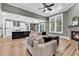 Spacious living room and kitchen offer an ideal blend of comfort and style for modern living at 103 Pigeon Forge Ct., Murrells Inlet, SC 29576