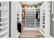 Large walk-in closet featuring custom shelving and storage solutions at 103 Pigeon Forge Ct., Murrells Inlet, SC 29576