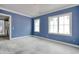Bedroom with abundant natural light from two large windows and crown moulding at 105 Michau Rd., Georgetown, SC 29440