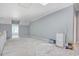 Bright bonus room with natural light, neutral paint, and doorway to an adjacent room at 105 Michau Rd., Georgetown, SC 29440