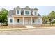 Charming new construction home featuring a brick foundation, covered porch, and gable roof at 105 Michau Rd., Georgetown, SC 29440