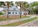 New construction home with HardiePlank siding, rear-entry garage, and mature landscaping at 105 Michau Rd., Georgetown, SC 29440