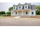 New construction home featuring a brick foundation, covered porch, and gable roof at 105 Michau Rd., Georgetown, SC 29440