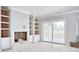 Cozy living room with fireplace, built-in shelving, and natural light at 105 Michau Rd., Georgetown, SC 29440