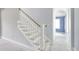 Classic white staircase with wooden handrail leading to the upper level at 105 Michau Rd., Georgetown, SC 29440