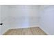 Walk-in closet featuring wood-look floors and shelving at 1079 Laconic Dr., Myrtle Beach, SC 29588