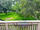 Scenic backyard view of lush greenery and trees from an outdoor balcony at 108 Westhill Circle # 7-E, Myrtle Beach, SC 29572