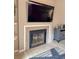Inviting fireplace with coastal decor and mounted television for a comfortable ambiance at 108 Westhill Circle # 7-E, Myrtle Beach, SC 29572