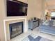 Cozy fireplace with tile surround and mounted TV in the living room at 108 Westhill Circle # 7-E, Myrtle Beach, SC 29572