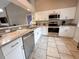 Beautiful kitchen featuring granite countertops, stainless steel appliances, and white cabinetry at 108 Westhill Circle # 7-E, Myrtle Beach, SC 29572