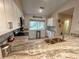 Modern kitchen features granite countertops, stainless steel appliances, and ample cabinet space at 108 Westhill Circle # 7-E, Myrtle Beach, SC 29572