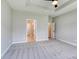 Spacious bedroom with tray ceilings, carpeted floors, and neutral walls at 1083 Laconic Dr., Myrtle Beach, SC 29588