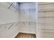Walk-in closet features built-in metal shelving for optimal storage and organization space at 1083 Laconic Dr., Myrtle Beach, SC 29588