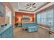 Nautical-themed bedroom with blue furniture, a ceiling fan, and lots of natural light at 1145 Captain Hooks Way, North Myrtle Beach, SC 29582