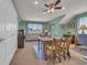 A living room that is also used as a dining room and office space at 1145 Captain Hooks Way, North Myrtle Beach, SC 29582