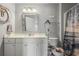 Bright bathroom featuring a vanity with a sink, a mirror, a toilet, and a shower/tub combination at 117 Butkus Dr. # 6, Myrtle Beach, SC 29588