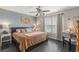 Cozy bedroom featuring a ceiling fan, a comfortable bed and bedside table with a reading lamp at 117 Butkus Dr. # 6, Myrtle Beach, SC 29588