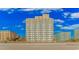 Beautiful exterior view of a beachfront hotel with multiple floors and private balconies at 1207 Ocean Blvd. S # 20802, Myrtle Beach, SC 29577