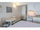 Cozy space featuring a bed, dining table with chairs and a kitchen area providing a homey atmosphere at 1207 Ocean Blvd. S # 20802, Myrtle Beach, SC 29577