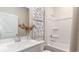 Bright bathroom with a combined shower and bathtub, and a modern vanity at 128 Dagger Ct., Myrtle Beach, SC 29588