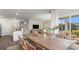 Open-concept dining area with modern decor, seamlessly connecting to the kitchen and living spaces at 128 Dagger Ct., Myrtle Beach, SC 29588