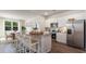 Stylish kitchen with a large island, stainless steel appliances, and ample cabinet space at 128 Dagger Ct., Myrtle Beach, SC 29588