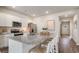 Modern kitchen with granite countertops, stainless steel appliances, and a breakfast bar at 128 Dagger Ct., Myrtle Beach, SC 29588