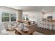 Open-concept living space flowing from the living room to the dining and kitchen areas at 128 Dagger Ct., Myrtle Beach, SC 29588