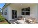 Charming outdoor patio with modern furniture, perfect for relaxing and entertaining at 128 Dagger Ct., Myrtle Beach, SC 29588