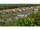 Aerial view of 1298 River Oaks Dr highlighting its location near a waterway and lush trees at 1298 River Oaks Dr. # 5-I, Myrtle Beach, SC 29579