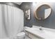 Modern bathroom featuring a vanity and shower with white shower curtain at 1298 River Oaks Dr. # 5-I, Myrtle Beach, SC 29579